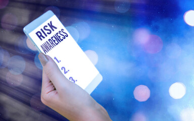 Conceptual hand writing showing Risk Awareness. Concept meaning recognizing factors that may cause...