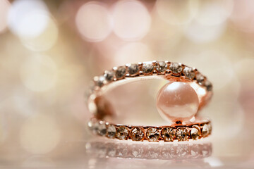Close up shot of golden ear ring
