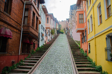 Fototapeta na wymiar Hill with stairs and colorful houses, Balat, istanbul