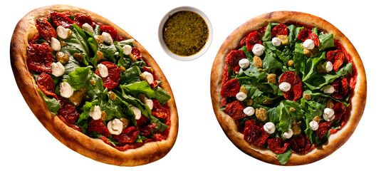 Brazilian pizza with dried tomato, arugula and mustard. Top view on white background, close up. Traditional Brazilian Pizza