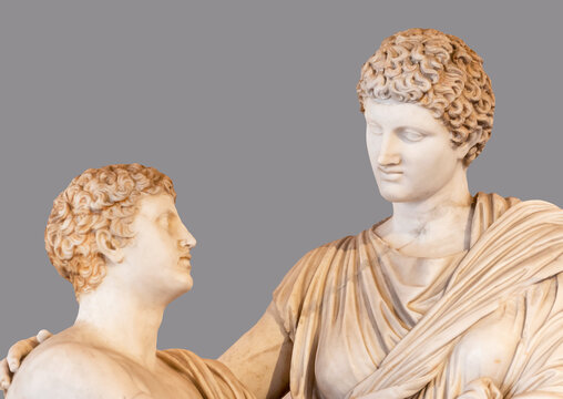 Ancient roman statues showing a faher and a son interacting
