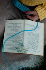 knitting on the book
