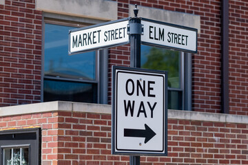 Fototapeta na wymiar One way street sign on a street corner in a city