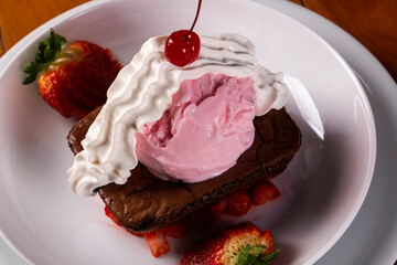 Chocolate Brownie with strawberry Ice Cream