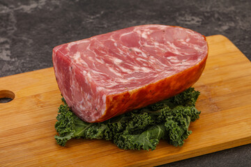 Beef ham piece over board