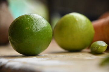 limes on a kitchen table