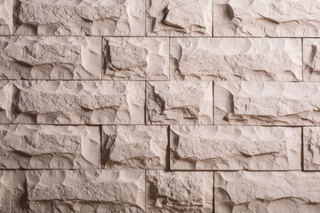 Decorative stone wall as background.