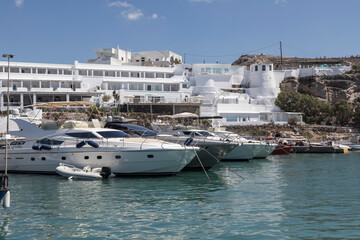 Moored boats at Vlychada harbor on Santorini island in Greece.