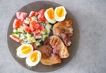 Beef, steak and fried chicken with vegetables