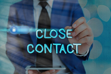 Writing note showing Close Contact. Business concept for having a history of direct exposure to a...
