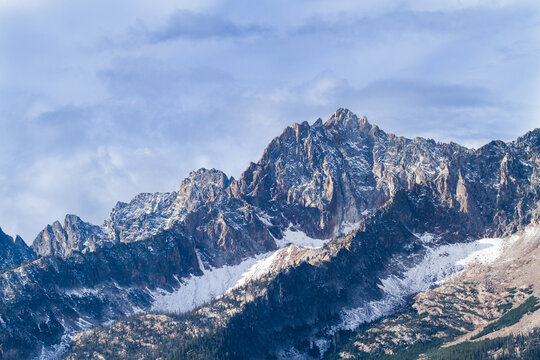 the Sawtooth mountains in the fall season with an early snow near Stanley, Idaho.