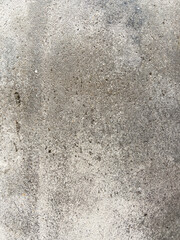 Unfinished not painted cement wall in gray color