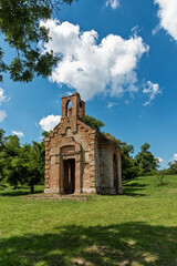 Fototapeta na wymiar Titel, Serbia - June 25, 2020: Remains of old ruined monastery church on the hill above small town of Titel in Vojvodina, Serbia. Plateau of Titel