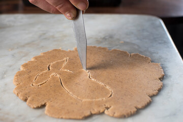 baking cookies in festive time, christmas, easter, baking in old oven on fire.