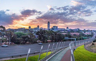 Obraz premium Sandton city view from Grayston Drive during twilight sunset