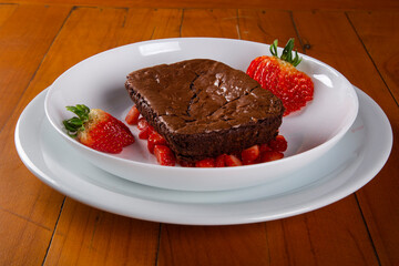 Homemade chocolate brownies with strawberry
