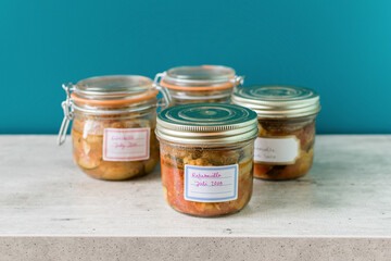 jam jar of ratatouille with vegetables in the kitchen interior