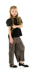 Little girl points with a finger