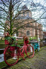 Fototapeta premium Cute Bicycle Flower Pot in Delft, Netherlands