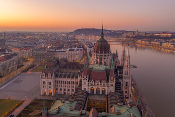 Fototapeta na wymiar Aerial drone shot of Dome of Hungarian Parliament at dawn before sunrise in Budapest morning