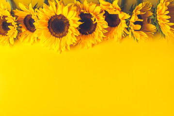 Yellow Sunflower Bouquet on bright Yellow Background, Autumn Concept, Top View, Space for Text
