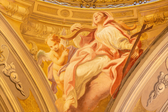 COMO, ITALY - MAY 8, 2015: The fresco of cardinal virtue of Faith in church Santuario del Santissimo Crocifisso by Carlo Inncenzo Carloni (first half of 18. cent.).