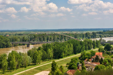 Fototapeta na wymiar Titel, Serbia - June 25, 2020: The river Tisa and the coast of the city of Titel. Photographed from Calvary, from the Titel plateau.