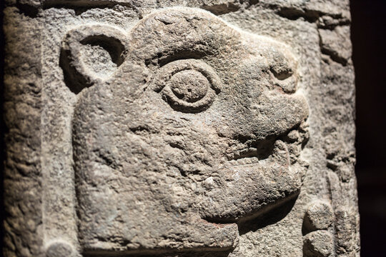Aztec art depicting the head of a jaguar. Carved stone with relief from Mexica culture showing the date "13 Jaguar", one of the days in the 260-day ritual calendar tonalpohualli