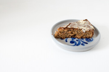 sliced carrot cake, served on a ceramic plate