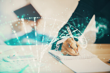 Double exposure of DNA theme drawing over people taking notes background. Concept of medical education