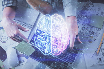 Double exposure of man and woman working together and human brain hologram drawing. Brainstorm...
