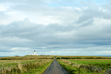 Fototapeta na wymiar Lighthouse and road
