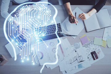 Double exposure of woman working on computer andhuman brain hologram drawing. Top View. Ai concept.