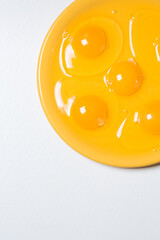raw eggs on a white background