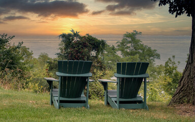  Wooden Adirondack chairs are Perfect seating for a sunset for two