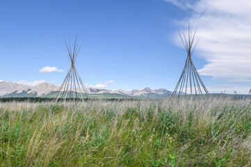 Tipi Poles on the Stoney Indian Reserve at Morley, Alberta, Canada © jkgabbert