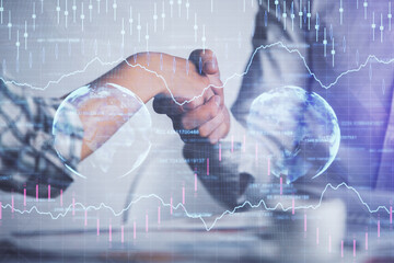 Double exposure of forex graph hologram and handshake of two men. Stock market concept.