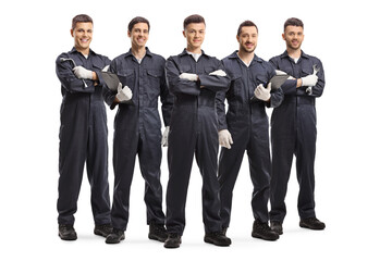 Team of five auto mechanic workers in uniforms - obrazy, fototapety, plakaty