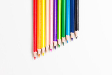 Isolated colored pencil on white background. Top view 