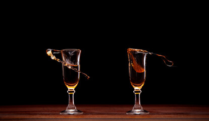 2 shots of cognac splashing