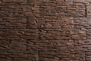 Decorative stone wall as background.
