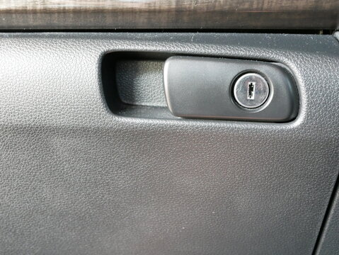 Lock And Handle For Opening On The Glove Compartment In A Modern Car,car Interior.