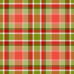 Seamless checkered plaid pattern. Traditional tartan textile ornament in green and red colors. For Christmas textile or wrapping paper design