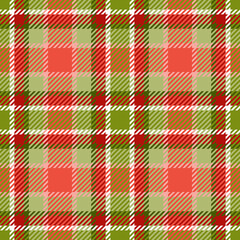 Seamless checkered plaid pattern. Traditional tartan textile ornament in green and red colors. For Christmas textile or wrapping paper design