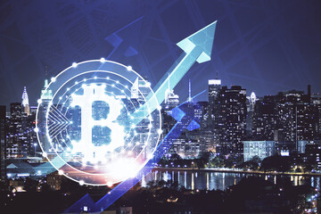 Multi exposure of cryptocurrency theme hologram drawing and city veiw background. Concept of blockchain and bitcoin.