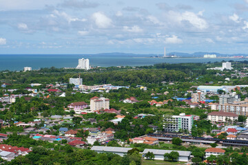rayong city in thailand have industrial estate on blue sea or ocean with chimney and tank for industry and home resort or hotel by real estate business with nature green tree for travel on clear sky