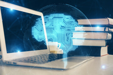 Double exposure of work space with computer and human brain drawing hologram. Brainstorm concept.