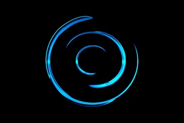 Blue fire comet light flying in circle. Shining lights in motion with particles on black background