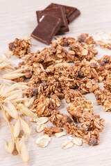 Granola, oat flakes and chocolate, healthy food for breakfast