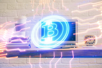 Multi exposure of blockchain theme hologram and table with computer background. Concept of bitcoin...